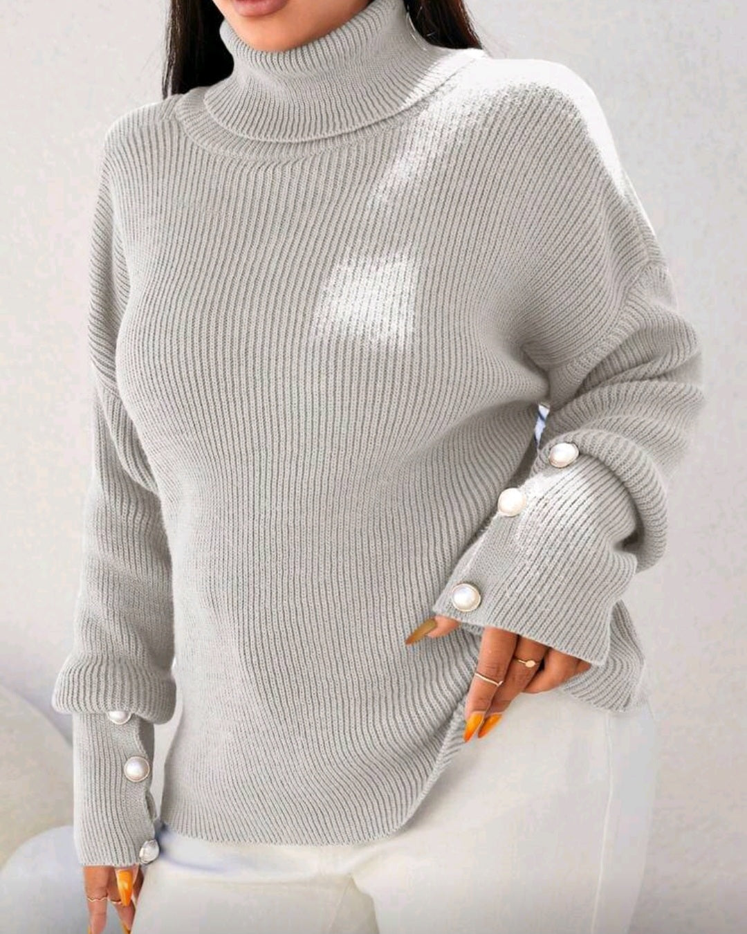 Volný pletený svetr